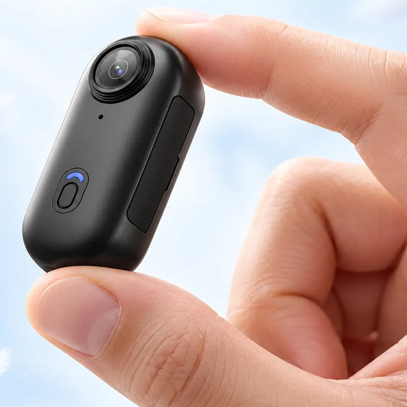 ORDRO H88 Pro 50g lightweight thumb-size action camera held between fingers to demonstrate its compact, portable design