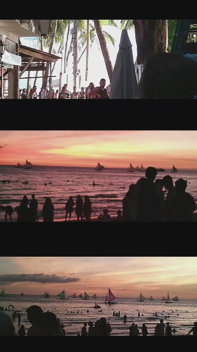 Low-light sunset beach with sailboats, filmed using the ORDRO HDV-V12 video camera.